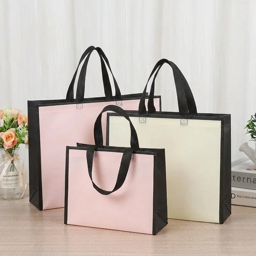 50pcs, 3 Sizes Light Pink w/ Black Border Non-woven Gift Bag