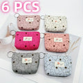 Six patterned coin purses 